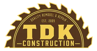 Logo for TDK Construction, featuring text framed by a saw blade silhouette in brown and gold colors.